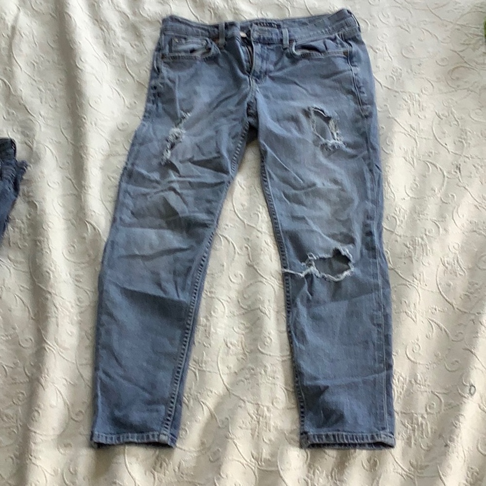 Distressed Blue Jeans